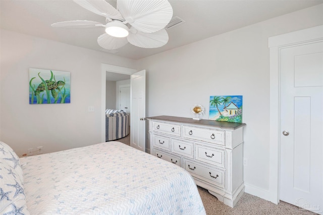 carpeted bedroom featuring ceiling fan