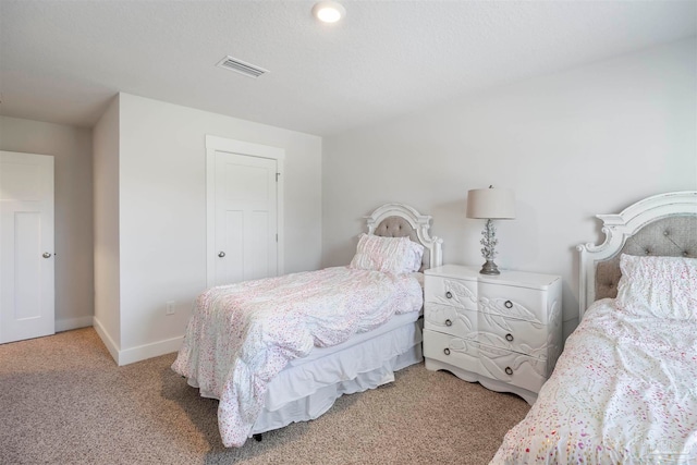 bedroom featuring carpet floors