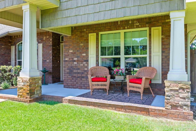 view of patio featuring a porch