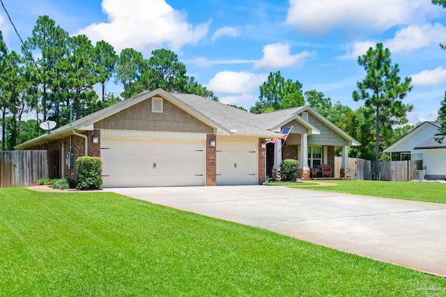 view of front of property featuring central AC unit, a garage, and a front lawn