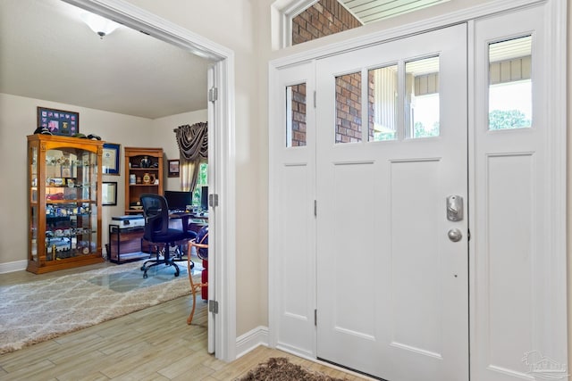 entryway with light hardwood / wood-style flooring