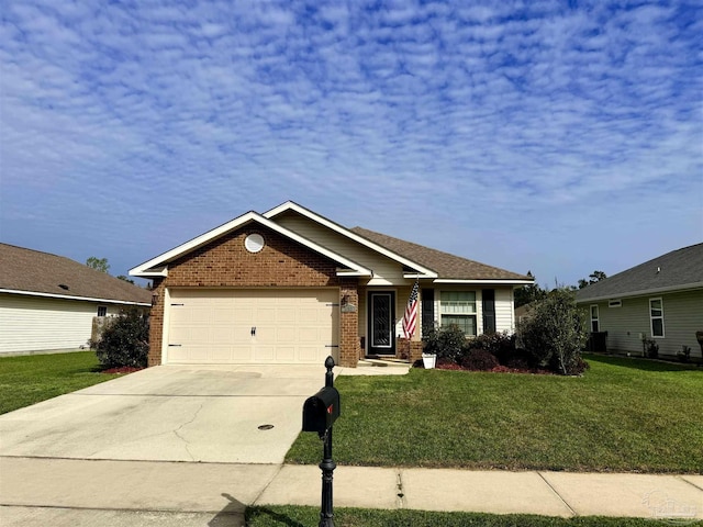 ranch-style house featuring an attached garage, concrete driveway, a front yard, and brick siding