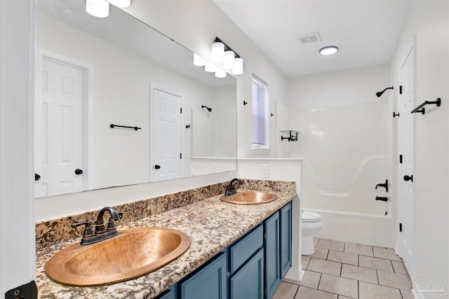 full bathroom featuring vanity, toilet, shower / tub combination, and tile patterned floors