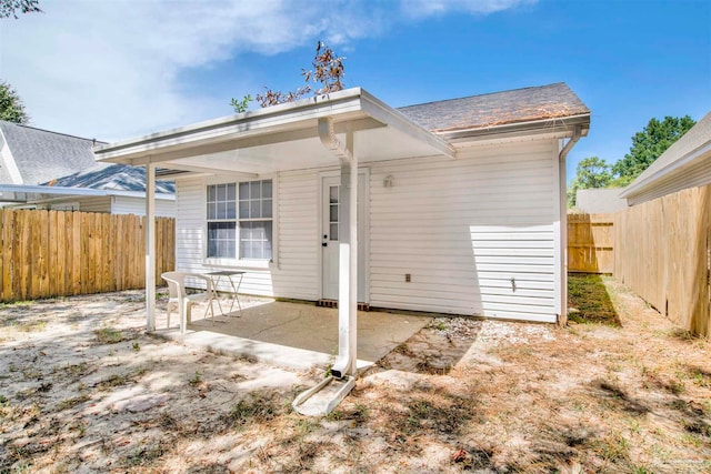 rear view of house featuring a patio area