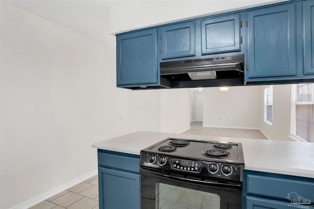 kitchen featuring blue cabinets and black / electric stove