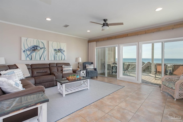 living room featuring ceiling fan, recessed lighting, light tile patterned floors, a water view, and ornamental molding