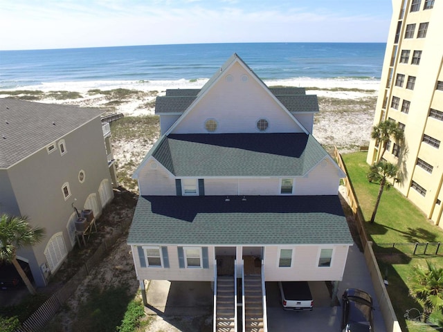bird's eye view with a beach view and a water view