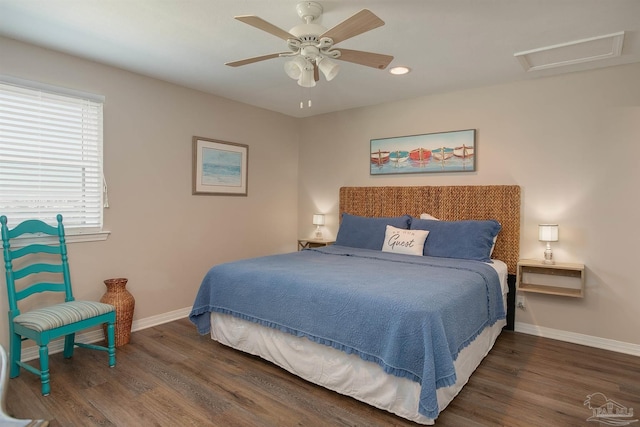 bedroom featuring ceiling fan, attic access, recessed lighting, baseboards, and wood finished floors
