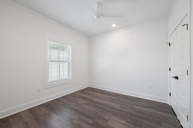 spare room featuring ornamental molding, dark hardwood / wood-style floors, and ceiling fan