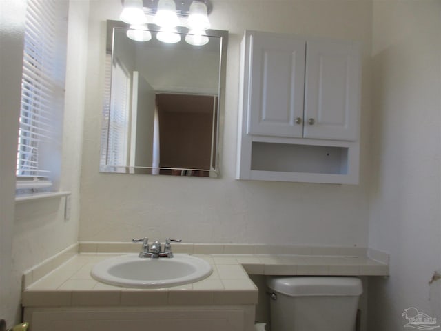 half bath with toilet and vanity