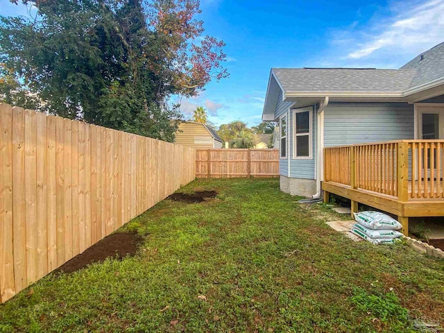 view of yard with a deck