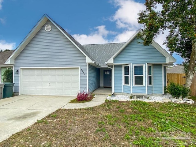 single story home featuring a garage and a front yard