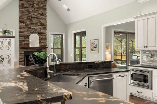 8901 Salt Grass Dr, Pensacola, FL 32526 - kitchen with stainless steel appliances, plenty of natural light, visible vents, and a sink