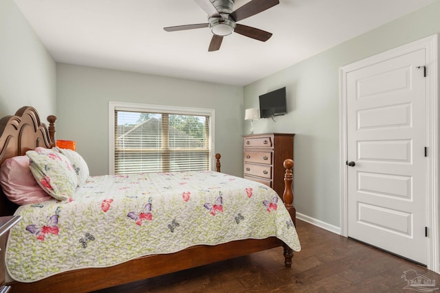 8901 Salt Grass Dr, Pensacola, FL 32526 - bedroom with ceiling fan, dark wood-style flooring, and baseboards