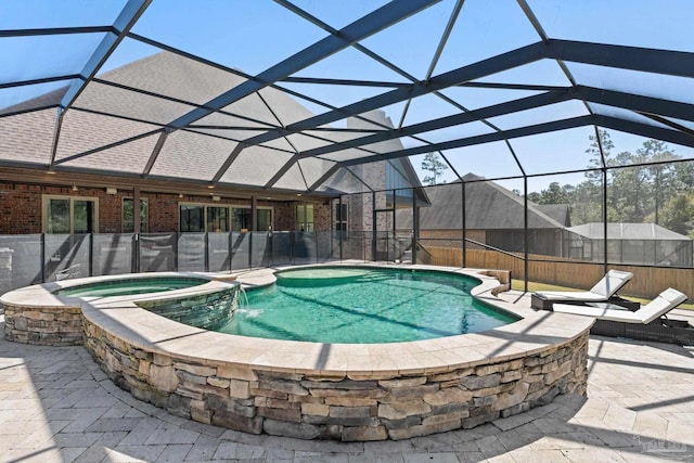 8901 Salt Grass Dr, Pensacola, FL 32526 - view of pool featuring glass enclosure, a patio area, fence, and a pool with connected hot tub