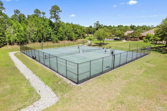 8901 Salt Grass Dr, Pensacola, FL 32526 - view of tennis court featuring a yard and fence