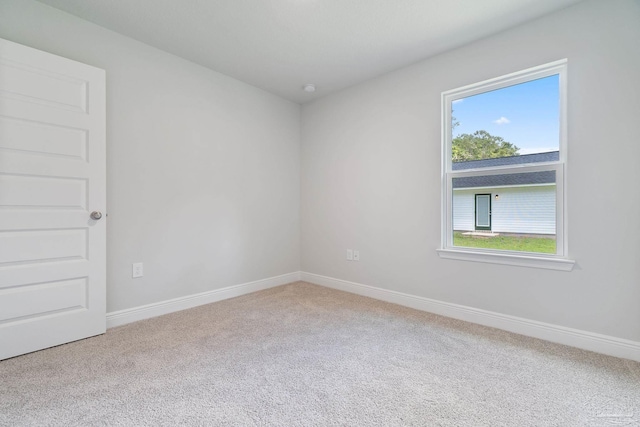 empty room featuring carpet floors