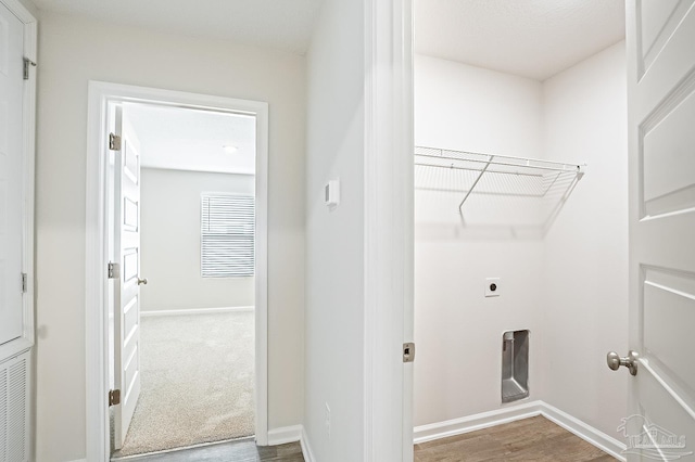 5805 Guinevere Ln, Milton, FL 32583 - laundry room featuring electric dryer hookup and baseboards