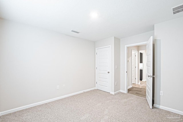 5805 Guinevere Ln, Milton, FL 32583 - unfurnished bedroom featuring carpet and baseboards
