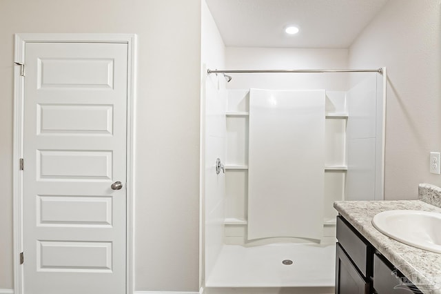 5805 Guinevere Ln, Milton, FL 32583 - bathroom featuring a shower and vanity