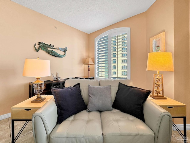 tiled living room with a textured ceiling