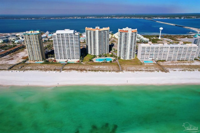 aerial view featuring a water view and a beach view