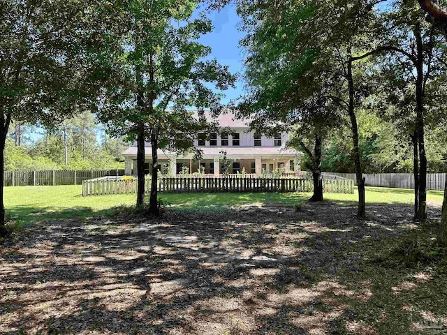 exterior space featuring a fenced backyard