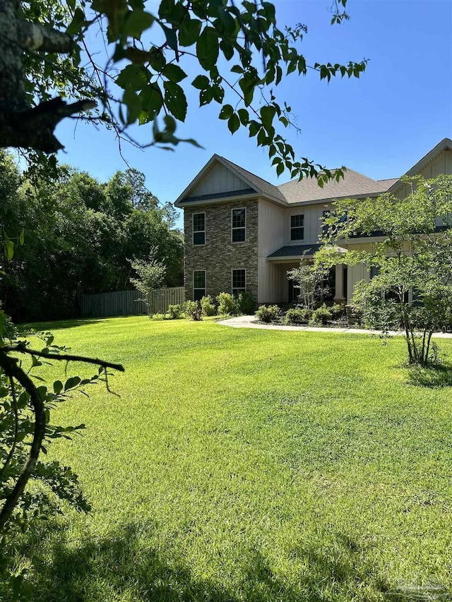 view of yard with fence