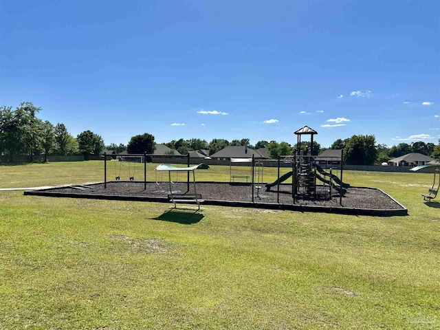 communal playground with a lawn