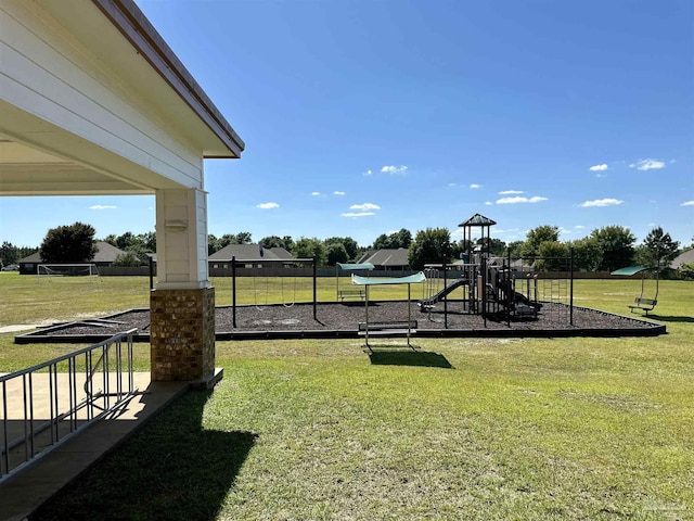communal playground with a lawn