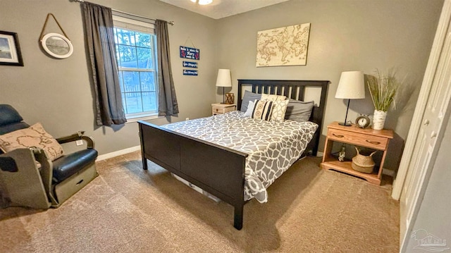 bedroom with light colored carpet