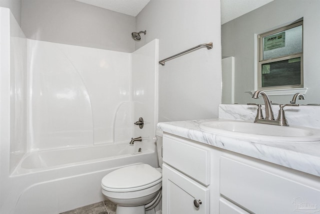 full bathroom with shower / washtub combination, vanity, a textured ceiling, and toilet