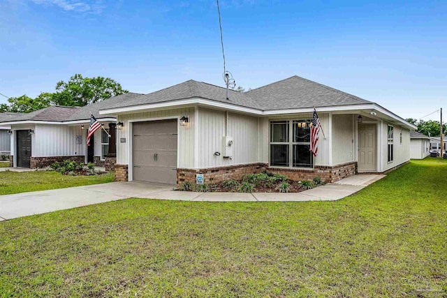 view of front facade featuring a garage and a front yard