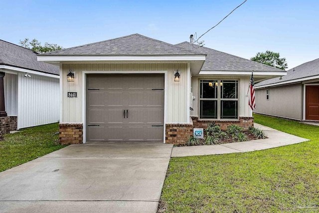 single story home with a garage and a front yard