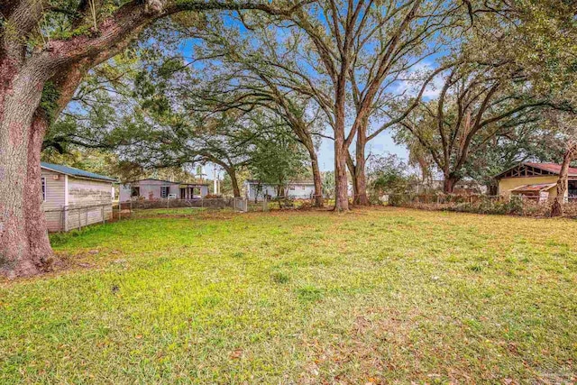 view of yard with fence