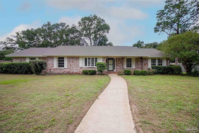 ranch-style house with a front yard