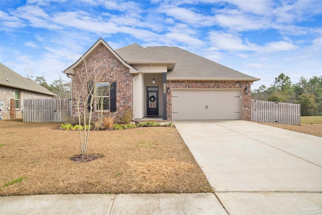 view of front of property with a garage