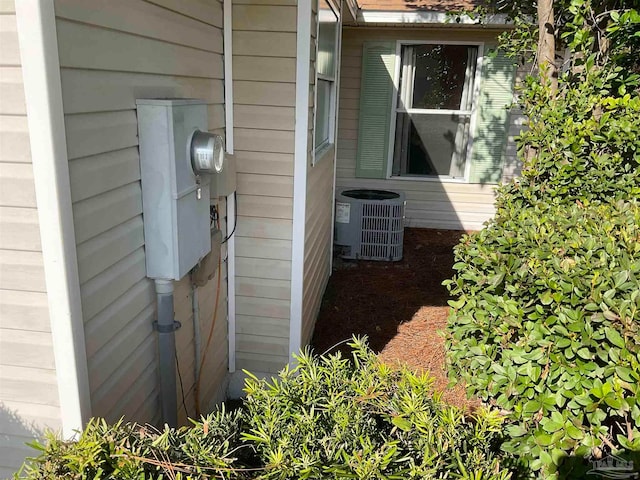 view of home's exterior featuring cooling unit