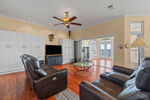 4757 Chinquapin Dr, Gulf Breeze, FL 32563 - living room with ceiling fan, wood finished floors, ornamental molding, french doors, and recessed lighting