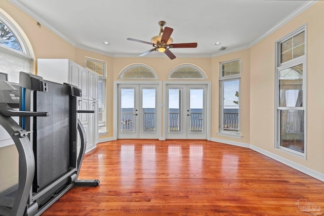 4757 Chinquapin Dr, Gulf Breeze, FL 32563 - exercise area with light wood-type flooring, french doors, recessed lighting, crown molding, and ceiling fan