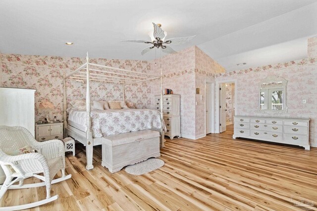 4757 Chinquapin Dr, Gulf Breeze, FL 32563 - bedroom featuring wallpapered walls, wood finished floors, and lofted ceiling