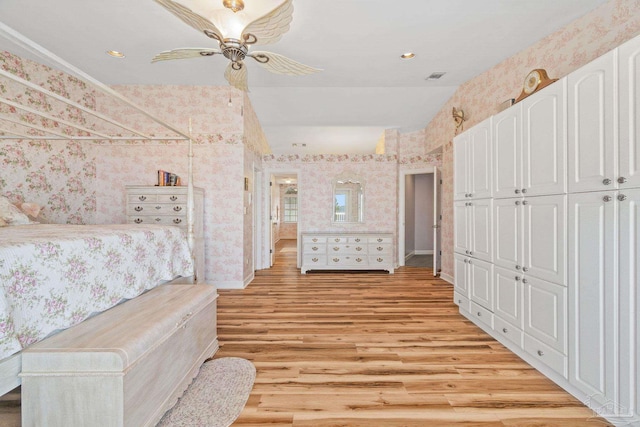 4757 Chinquapin Dr, Gulf Breeze, FL 32563 - bedroom with wallpapered walls, light wood finished floors, ceiling fan, recessed lighting, and a closet