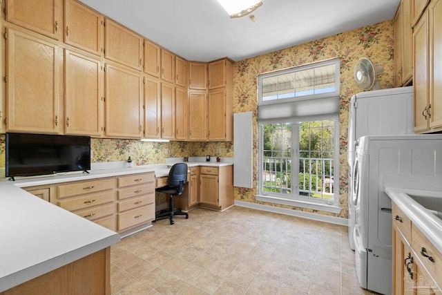 4757 Chinquapin Dr, Gulf Breeze, FL 32563 - office with wallpapered walls, built in desk, washer / dryer, and baseboards