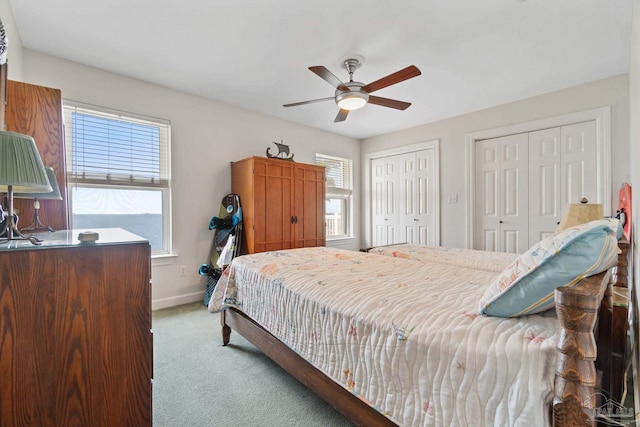 4757 Chinquapin Dr, Gulf Breeze, FL 32563 - bedroom with carpet floors, multiple closets, multiple windows, and baseboards