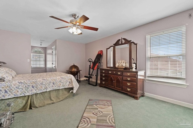 4757 Chinquapin Dr, Gulf Breeze, FL 32563 - bedroom featuring baseboards, light carpet, and a ceiling fan