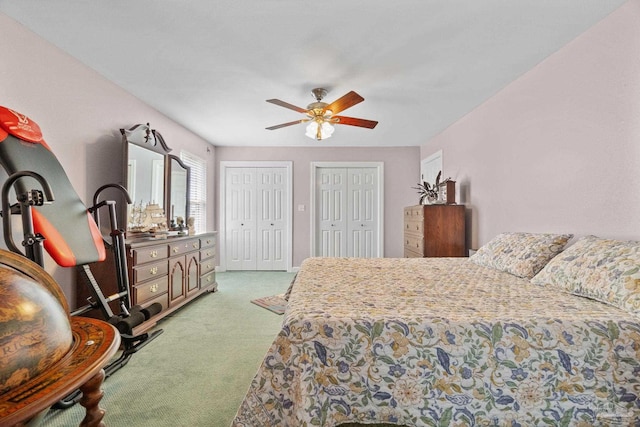 4757 Chinquapin Dr, Gulf Breeze, FL 32563 - bedroom with light carpet, multiple closets, and a ceiling fan