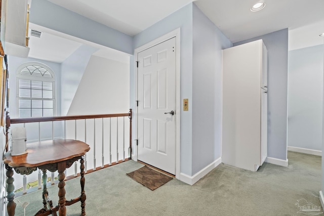 4757 Chinquapin Dr, Gulf Breeze, FL 32563 - foyer entrance with light carpet, baseboards, and recessed lighting