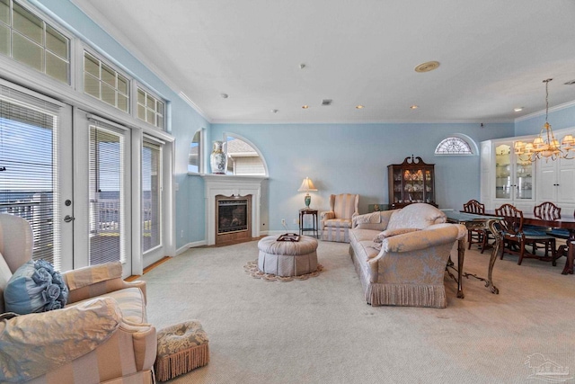 4757 Chinquapin Dr, Gulf Breeze, FL 32563 - carpeted living area featuring a chandelier, crown molding, a fireplace, recessed lighting, and baseboards