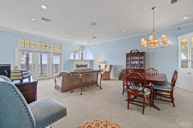 4757 Chinquapin Dr, Gulf Breeze, FL 32563 - living room with light colored carpet, a chandelier, ornamental molding, recessed lighting, and baseboards