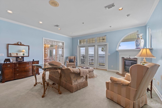 4757 Chinquapin Dr, Gulf Breeze, FL 32563 - living area featuring carpet, ornamental molding, a glass covered fireplace, recessed lighting, and baseboards